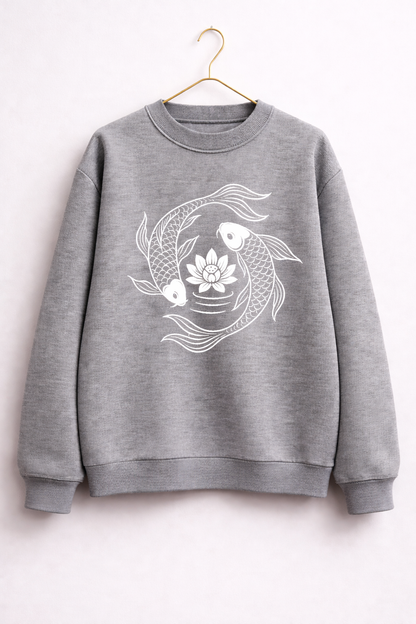 Gray sweatshirt with white fish and flower design on a hanger against a white background
